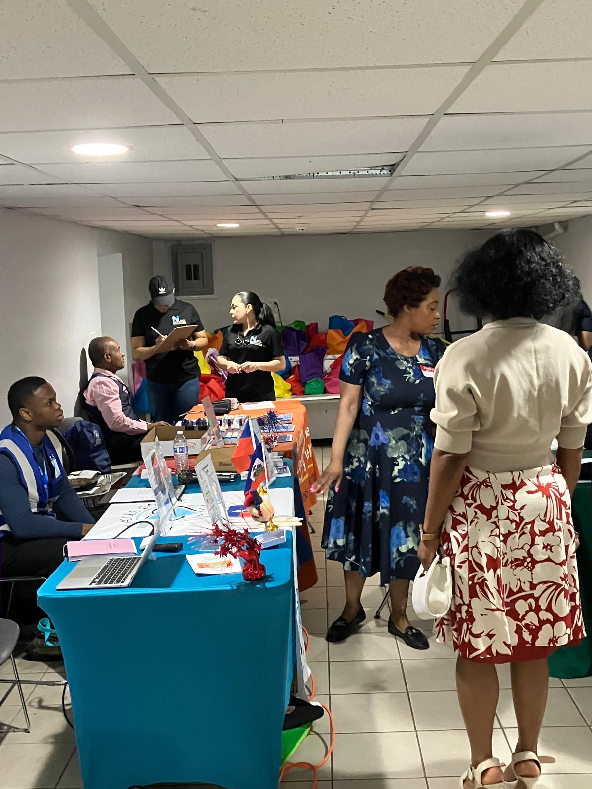 Community members with giveaway bags